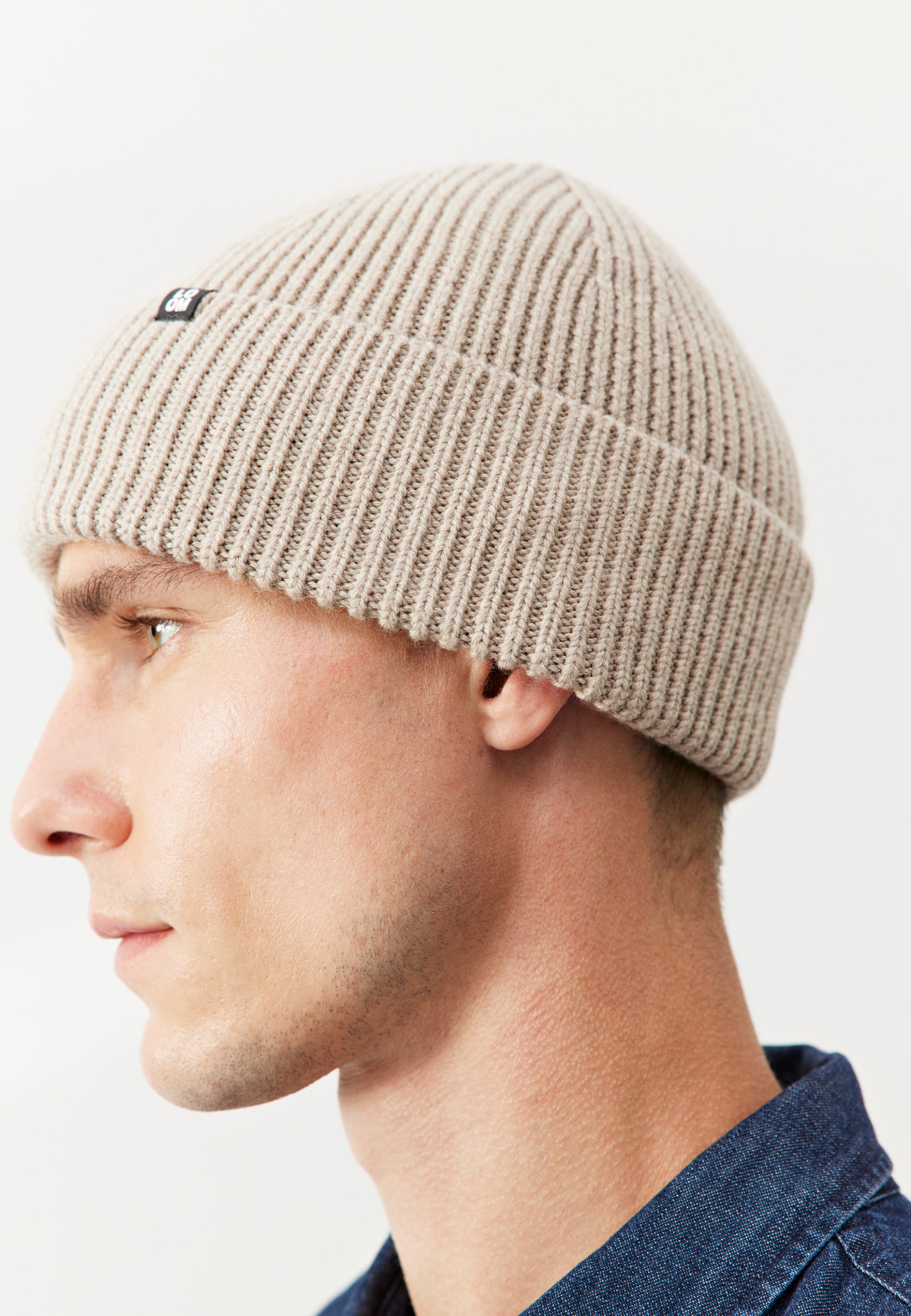 bonnet laine loom homme beige clair main